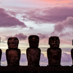 Moai of Easter Island (Rapa Nui) during a colorful sunrise.